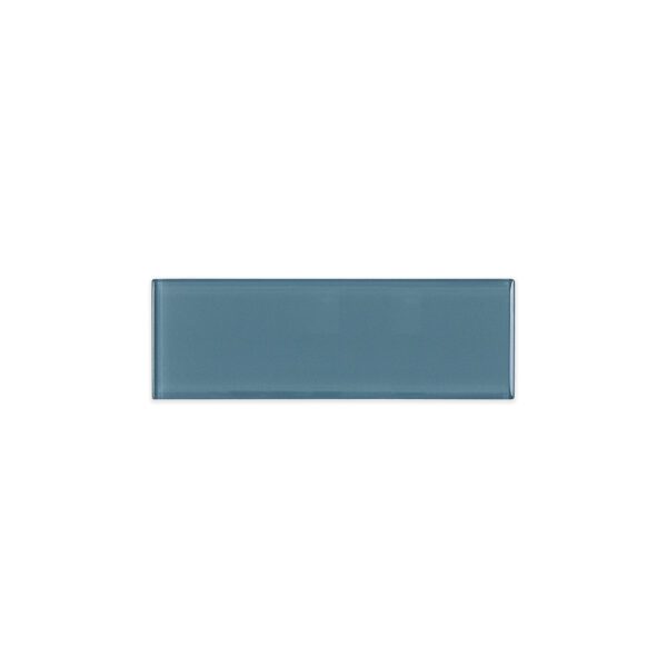 3x9 inch ocean grey glass subway tile with a smooth, glossy finish, designed to add coastal calm to interior spaces.