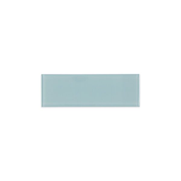 3x9 inch light grey glass subway tile with a glossy finish, designed to evoke tranquil tides in interior spaces.